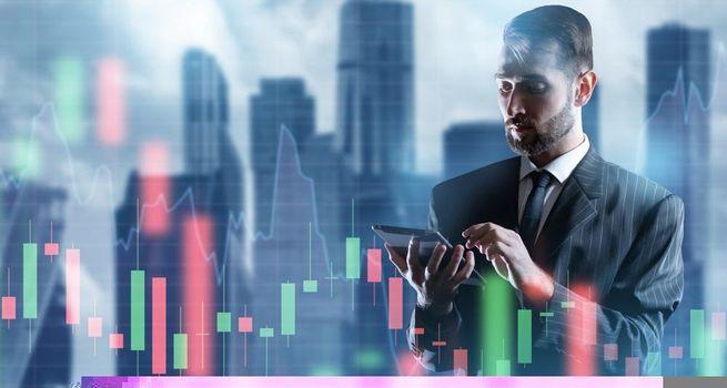 Rivian (NASDAQ:RIVN) Falls 5% as Layoffs Offset ChargeScape Partnership