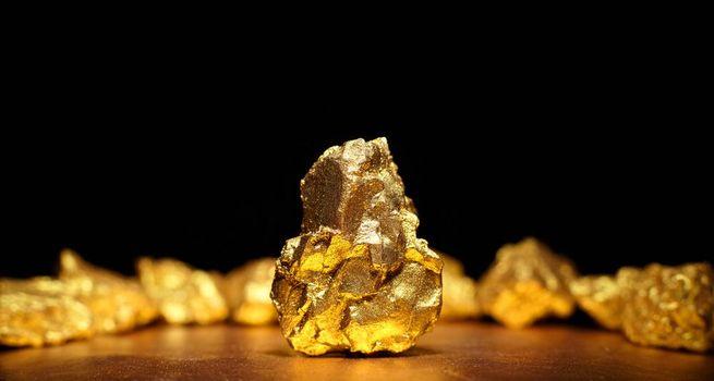 Gold Slides Nearly 3% After Hawkish Fed Outlook Drives Yields and Dollar Higher
