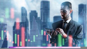 Rivian (NASDAQ:RIVN) Falls 5% as Layoffs Offset ChargeScape Partnership