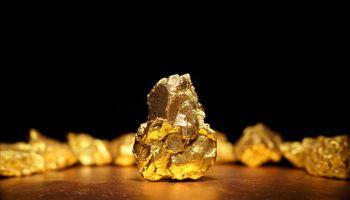 Gold Slides Nearly 3% After Hawkish Fed Outlook Drives Yields and Dollar Higher